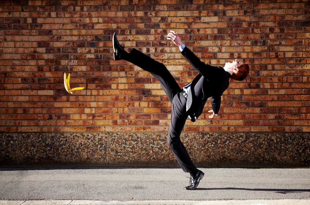 Indianapolis Slip and Fall Lawyer A young man slipping on a banana skin.