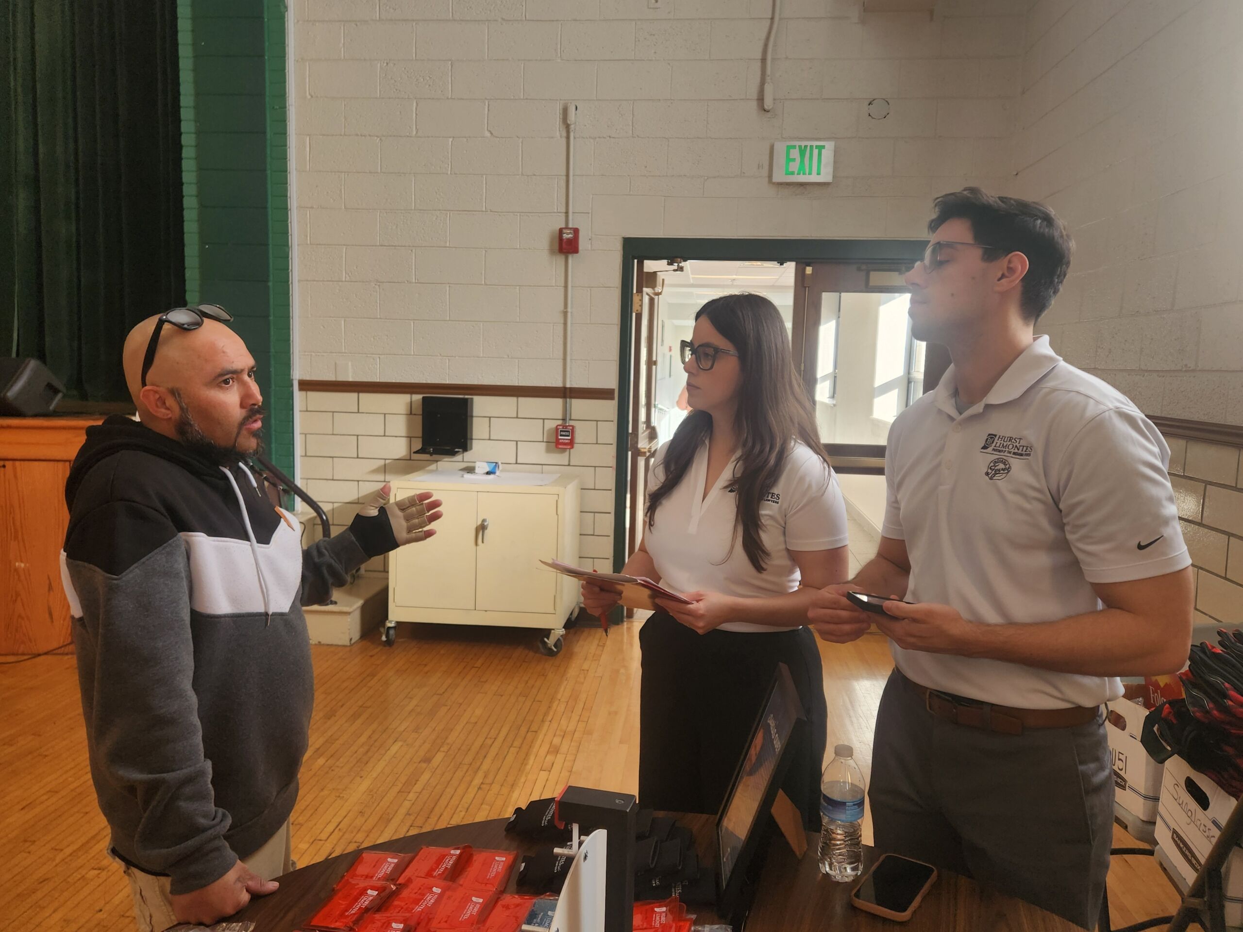 Leyda and Konrad at Holy Spirit Legal and Financial Fair Hurst Limontes attorneys Leyda Castro and Konrad Schmid attending the Holy Spirit Legal and Financial Fair