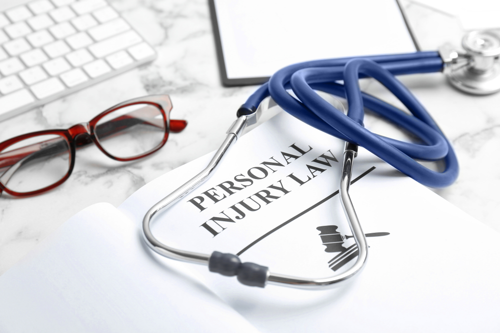 Stethoscope on a personal injury law document representing the role of medical evidence in injury claims.