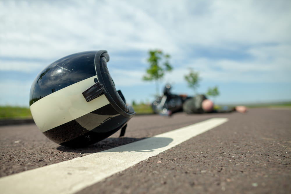 Helmet on the roadway after a bicycle crash showing the aftermath of a cycling accident