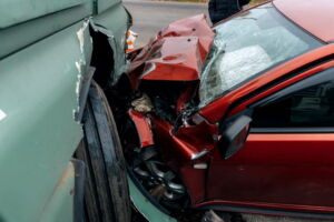 Serious car accident involving major vehicle damage that may increase insurance premiums