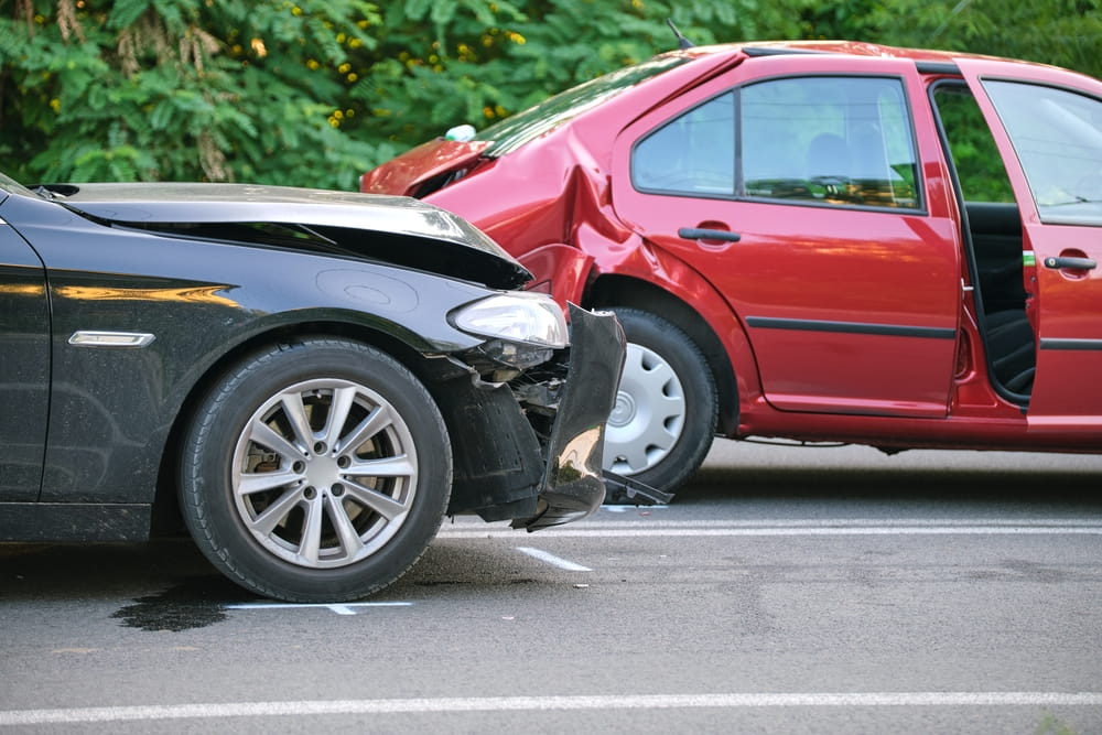 Two-car collision with significant vehicle damage that may result in a personal injury claim or settlement